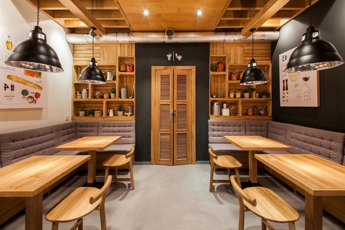 Casual wooden interior for an Israeli restaurant. Fresh greys and natural  greens - timberonweb - arkitectureonweb